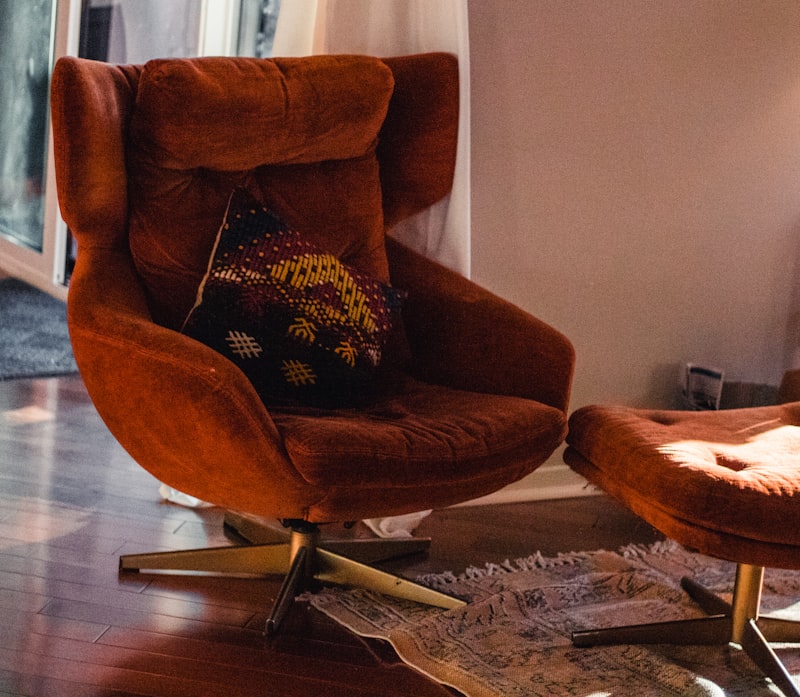 High-back wing lounge chair with ottoman