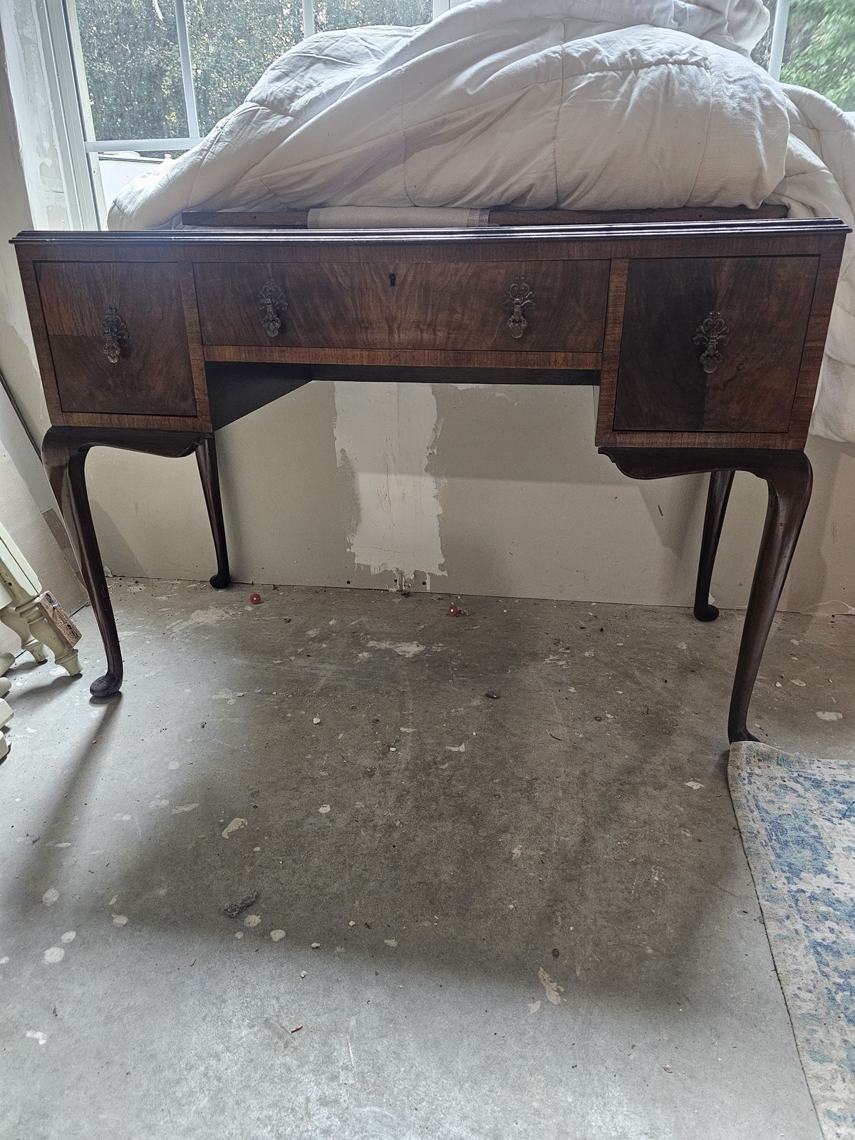 Queen Anne style walnut kneehole writing desk
